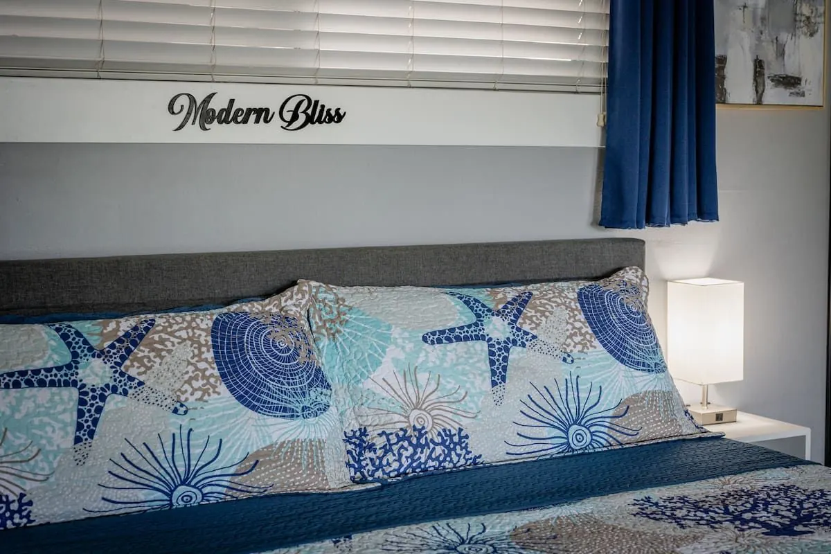 King bedroom with soothing blue accents