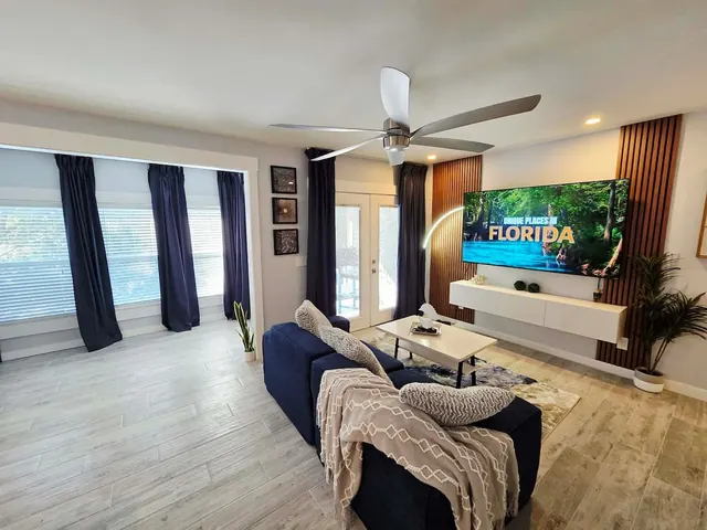 Living area with blue curtains
